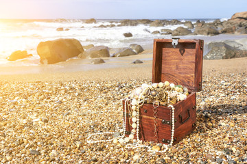Treasure chest on the ocean beach
