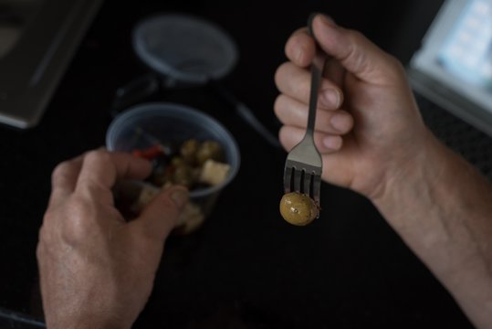 Man having breakfast at home