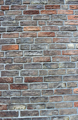 Hintergrund schwarz / rote Backsteinwand 