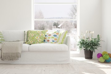 White room with sofa and winter landscape in window. Scandinavian interior design. 3D illustration