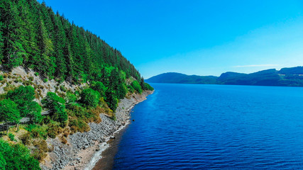 Fototapeta premium Loch Ness in the Scottish Highlands - the most famous lake in Scotland - aerial view