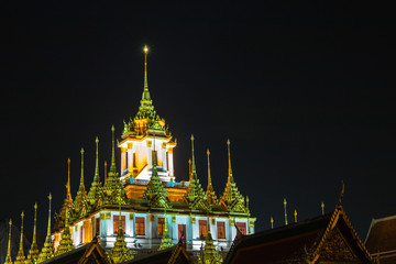 Naklejka premium Wat Ratchanatdaram Woravihara night view (Ratcha Natdaram Worawihan - Loha Prasat), Bangkok, Thailand