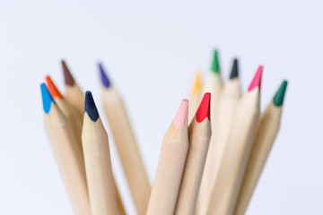 Colorful wooden pencils isolated on white background