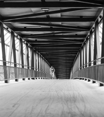 Cyclist rides through the tunnel