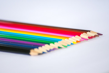 Colorful wooden pencils isolated on white background