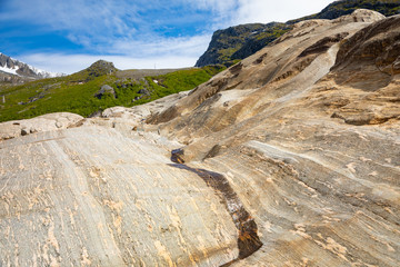 Rock formations near the Svartisen glacier, colorful natural backgroung, nord Norway