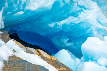 Blue ice cave of Svartisen Glacier in Norway