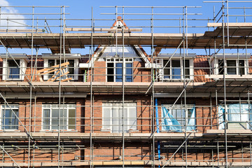 scaffolding at a residential building currently under construction