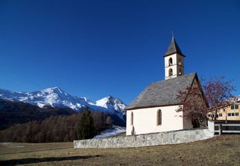 Fototapeta na wymiar Village chapel in Val Muestair, Canton Graubinden, Switzerland