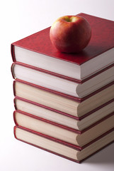 Books and apple
