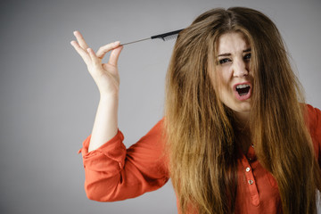 Woman having tangled hair