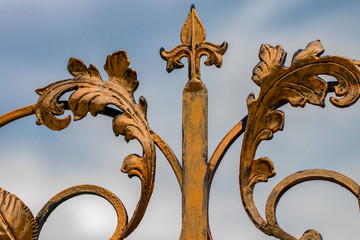ornate wrought-iron elements of metal gate decoration