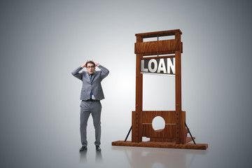 Businessman in debt and loan concept