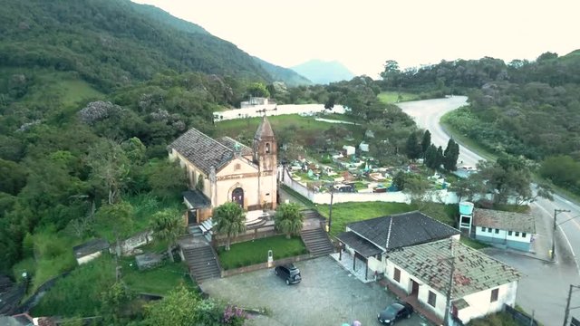 Aerial footage of old church and graveyard in Paranapiacaba