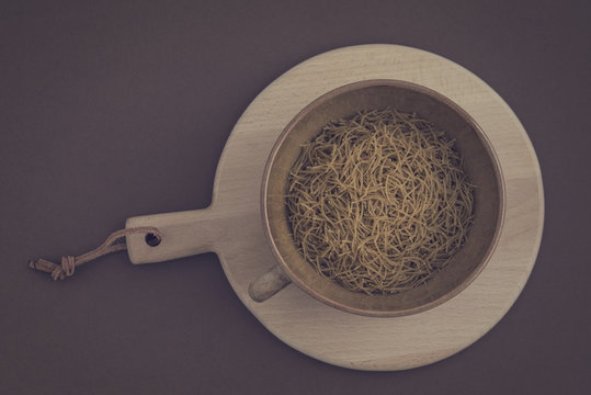 Overhead View Of Raw Noodles In A Cup