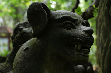 Fototapeta na wymiar Balinese ancient stone sculpture. Bali, Indonesia.
