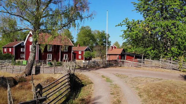 Panning footage of typical old Swedish village environment in Stensjo, Smaland