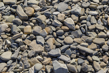 Stone pebbles texture background for interior exterior decoration and industrial construction concept design.