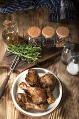 Raw marinated chicken drumsticks.