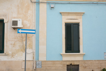 Pastel blue wall, Italy