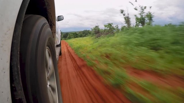 Action Side shot of a Tire driving off-road
