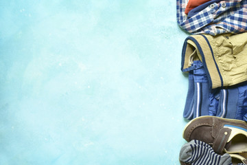 Fashion background with set of baby clothes.Top view with copy space.