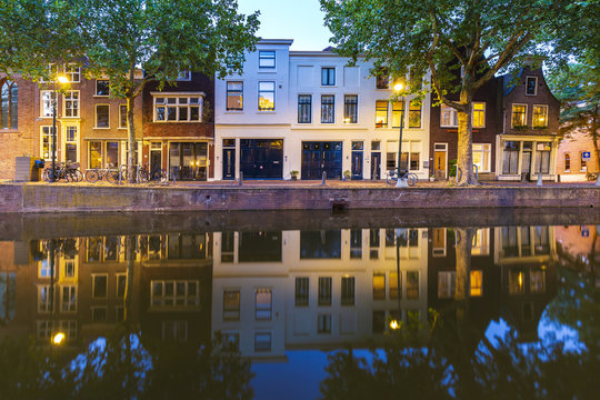 Street view on canals and monumental houses in historical city Gouda, the Netherlands