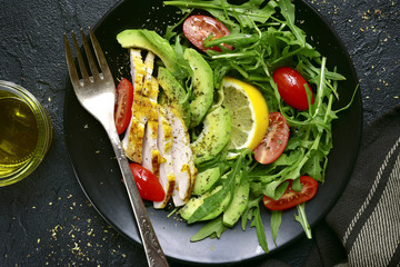 Vegetable salad with roasted chicken breast.Top view with copy space.