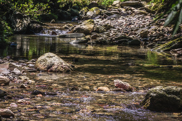Valley, water and stones scenery  