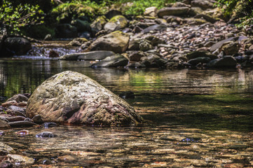 Valley, water and stones scenery  