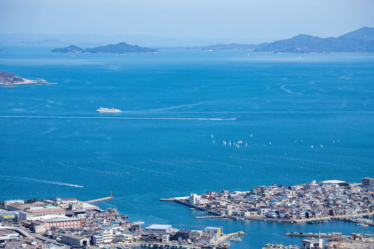 Landscape of the Seto Inland Sea(islands,port,ferry,yachts and city),Shikoku,Japan
