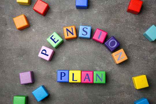 Colorful cubes with text PENSION PLAN on grey background