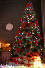 Fototapeta na wymiar Blurred view of stylish room interior with decorated Christmas tree