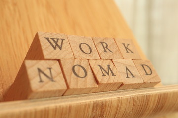 TOKYO, JAPAN. 2018 July 20th. Wooden Block Text of Nomad Working