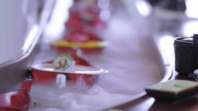 Running Sushi Buffet - Suhi rolls on boats