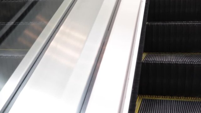 Stock footage of escalators.
