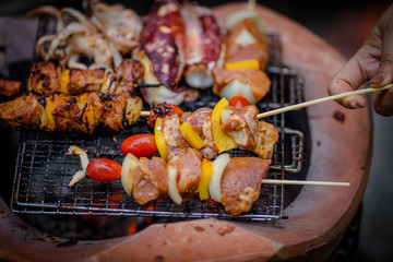 Assorted delicious barbecue with meat and vegetable on the stove.