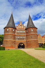 Fototapeta na wymiar View on Holsten Gate or Holstentor in German town Lubeck. Medieval gate. Historical monument. June 2017.