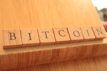 Wooden Block Text of Bitcoin.