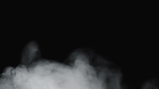 White smoke in front of black background