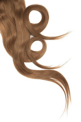 Brown hair, isolated over white. Circles made from hair