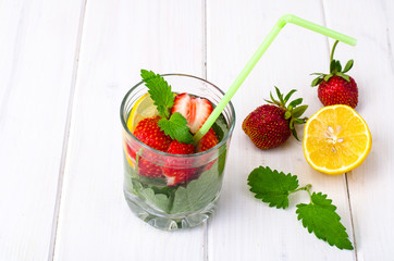Fruity drink refreshing on white wooden table