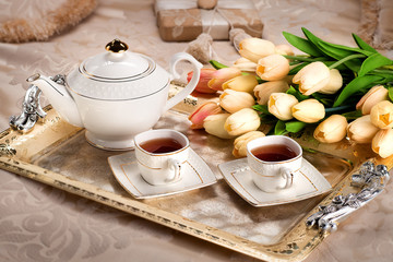 Romantic tea set with flowers. Nice good morning. Breakfast in bed. 