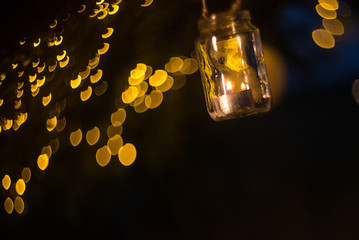 Night decorated zone outdoor; candles, lantern, board, vase, jar, lead board