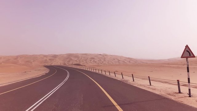 New road from Oasis Liwa to Moreeb Dune in Rub al Khali desert stock footage video