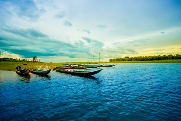 Fototapeta na wymiar Cityscape, River, Water, Hoi An, Old boats