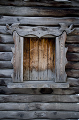 Wooden window with a cut-out frame