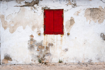 Rusty red shutters on building on the island of Bonaire, Netherlands Antilles
