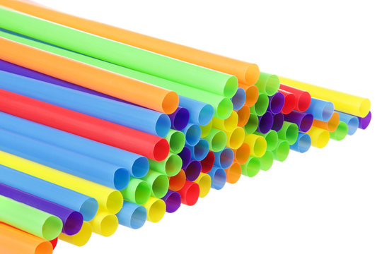 Many Colorful Plastic Straws With Opening Forward Isolated On White Background. San Francisco's Board Of Supervisors Voted Unanimously To Join Cities Such As Vancouver, Berkeley And Seattle In Banning