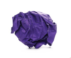 Crumpled purple paper ball isolated on white background